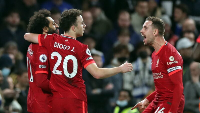 Oli SCARFF / AFP  Liverpool Mohamed Salah merayakan mencetak gol kedua