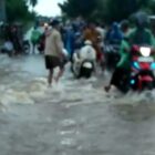 Banjir Genai Ruas jalan Tanjung Agung Palik